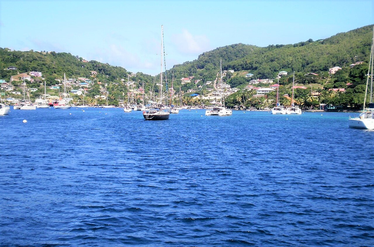 Moored boats in Port Elizabeth harbour, Bequia, below hillside homes