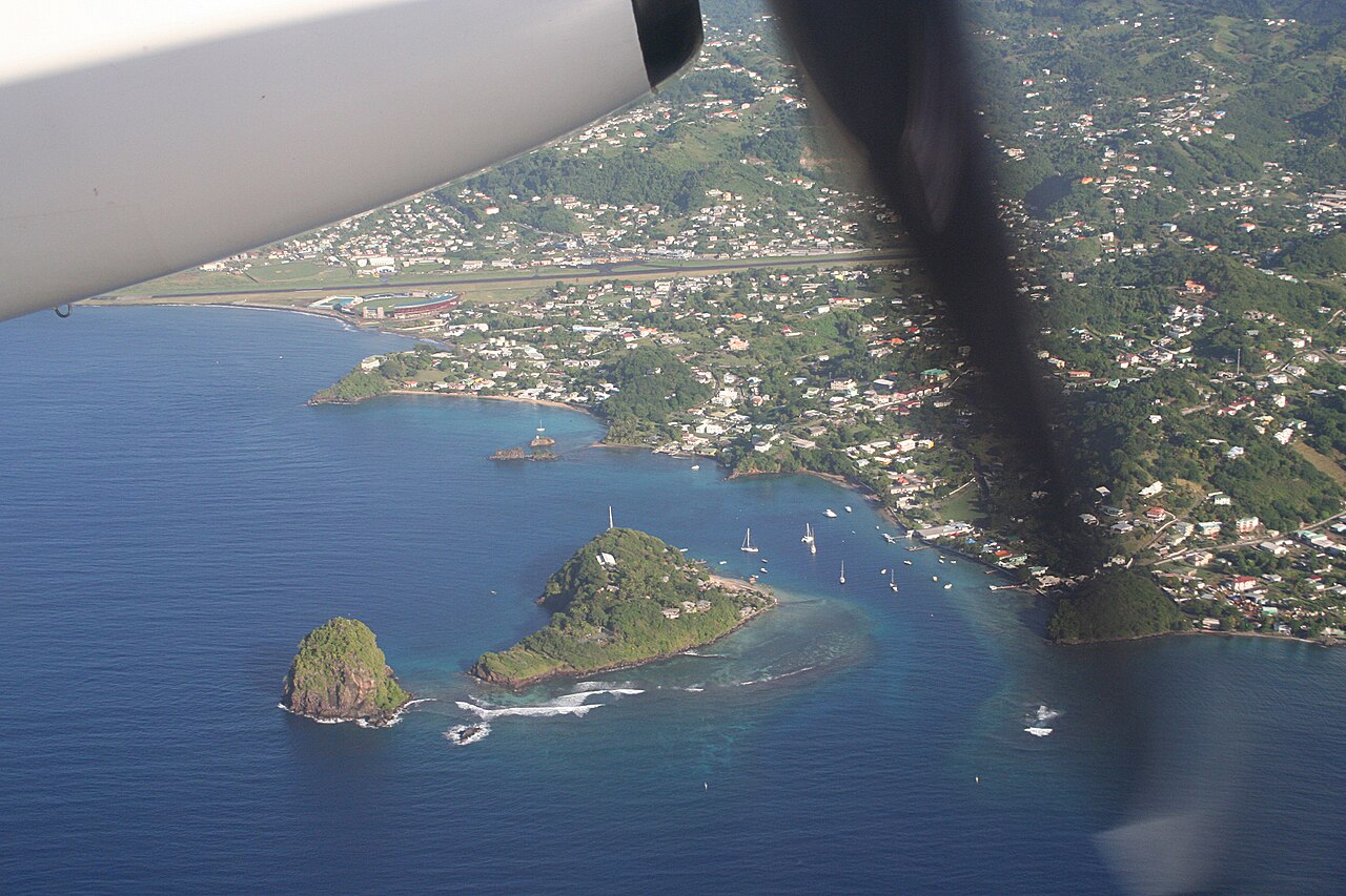 Aerial view from an aircraft window of Young Island and Arnos Vale cricket stadium, Saint Vincent